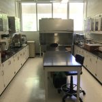 Lab room overview with fume hood in the background
