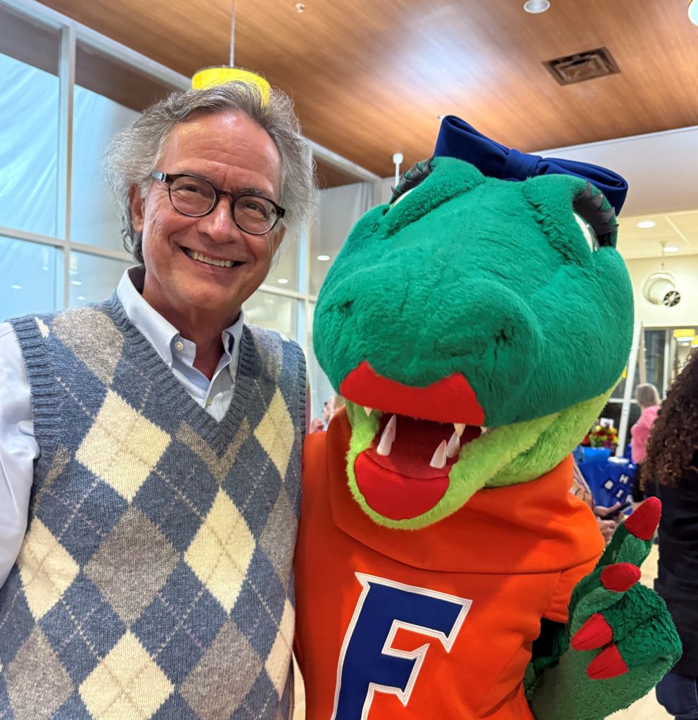 photograph of Prof. Mark E. Orazem and Alberta, the UF mascot.