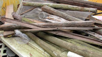 A pile of treated scrap wood